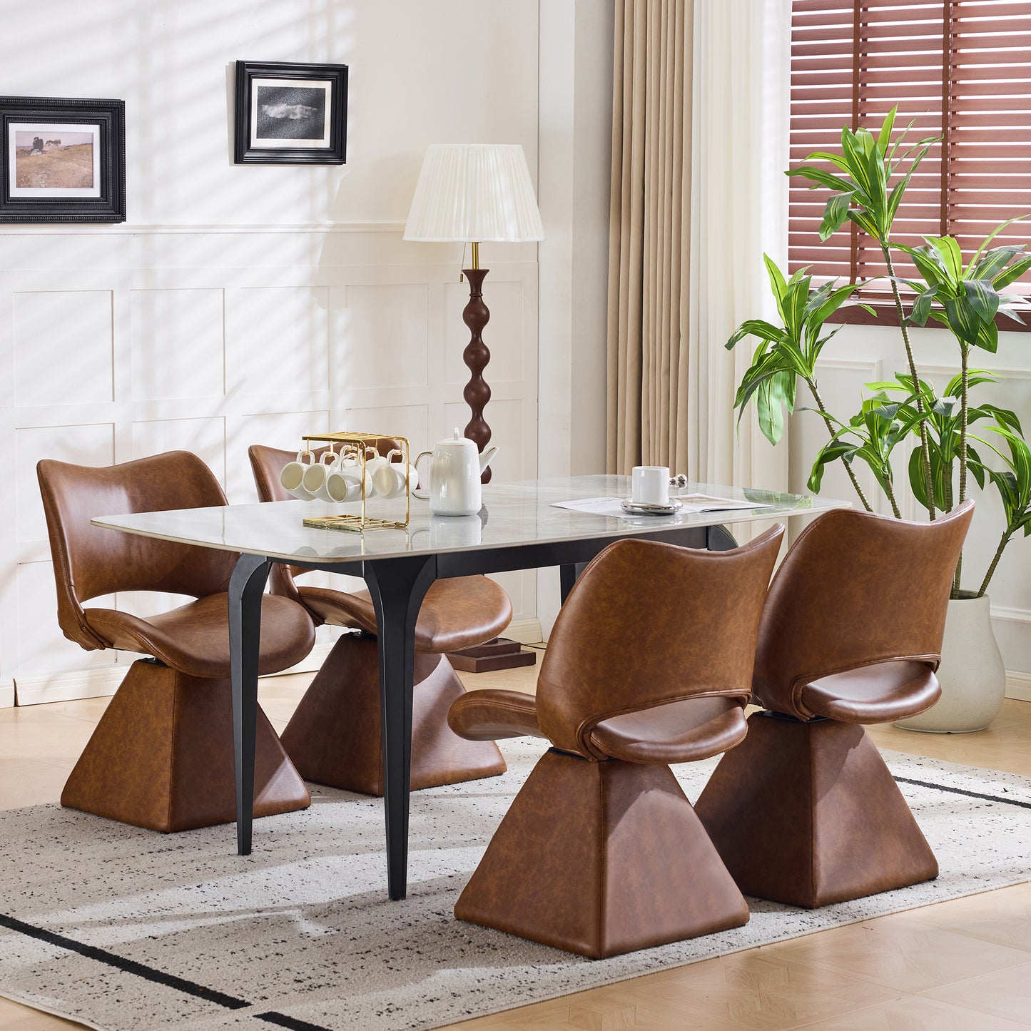 The swivel dining chair combines modern craftsmanship and can be combined in multiple sets. It is comfortable, artificial leather brown, and upholstered with modern high-back tables and chairs