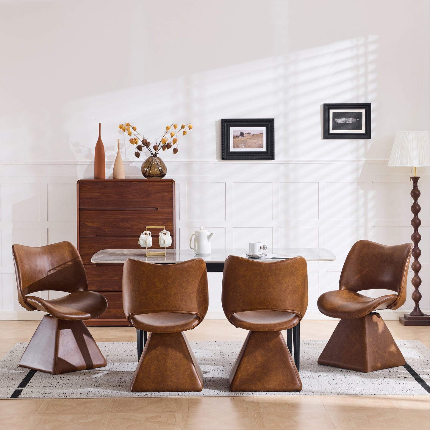 The swivel dining chair combines modern craftsmanship and can be combined in multiple sets. It is comfortable, artificial leather brown, and upholstered with modern high-back tables and chairs