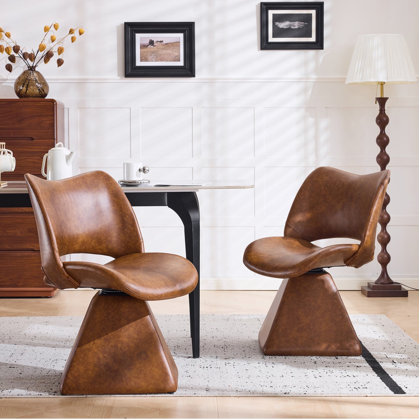 The swivel dining chair combines modern craftsmanship and can be combined in multiple sets. It is comfortable, artificial leather brown, and upholstered with modern high-back tables and chairs